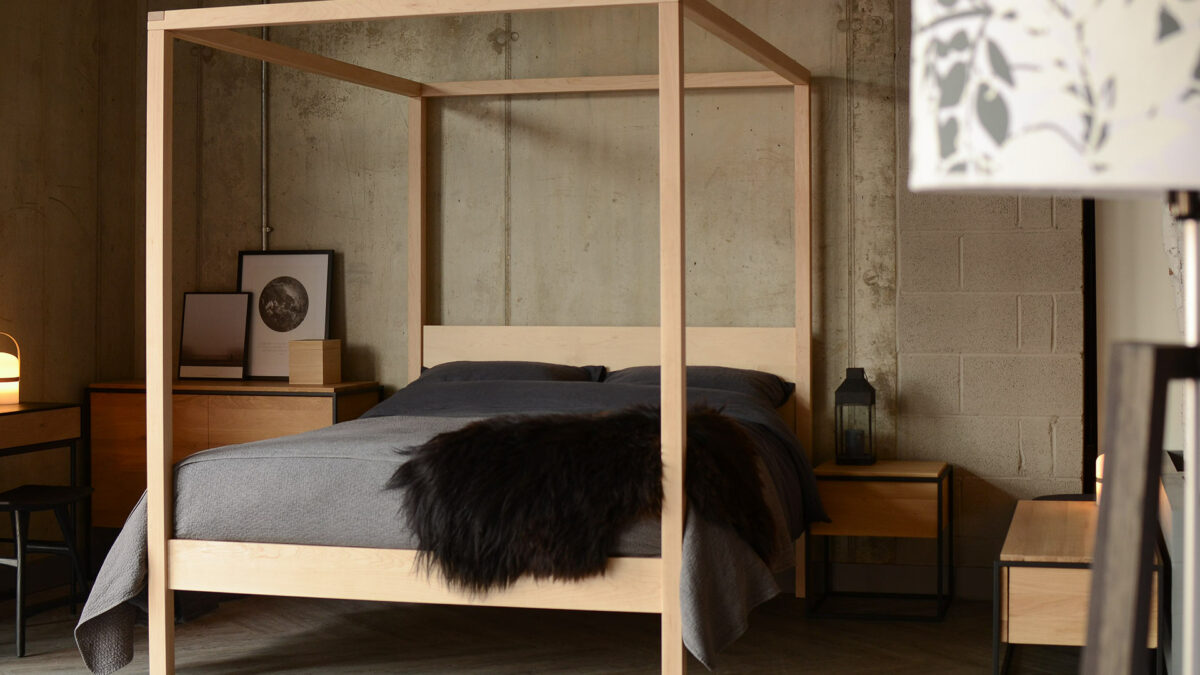 dark grey bedding on maple wood Orchid bed