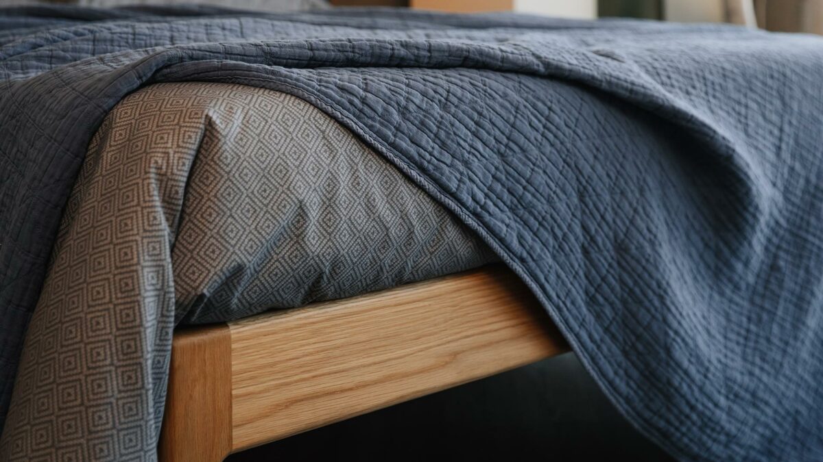 dark grey diamond print duvet set and blue cotton and linen bedspread