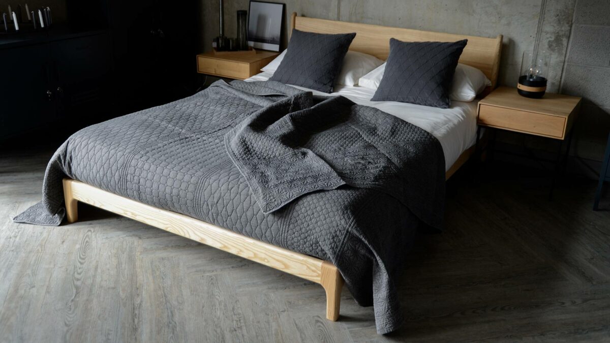 dark grey textured embroidered bedspread