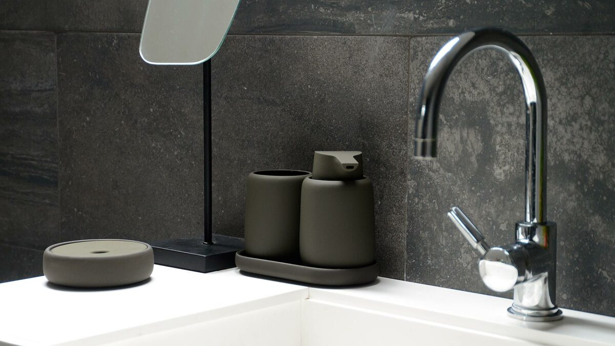 soft touch bathroom accessories in dark olive colour including soap dispenser and storage jar