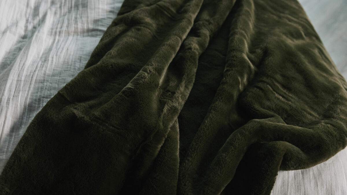 dark olive green softest faux fur throw shown close up