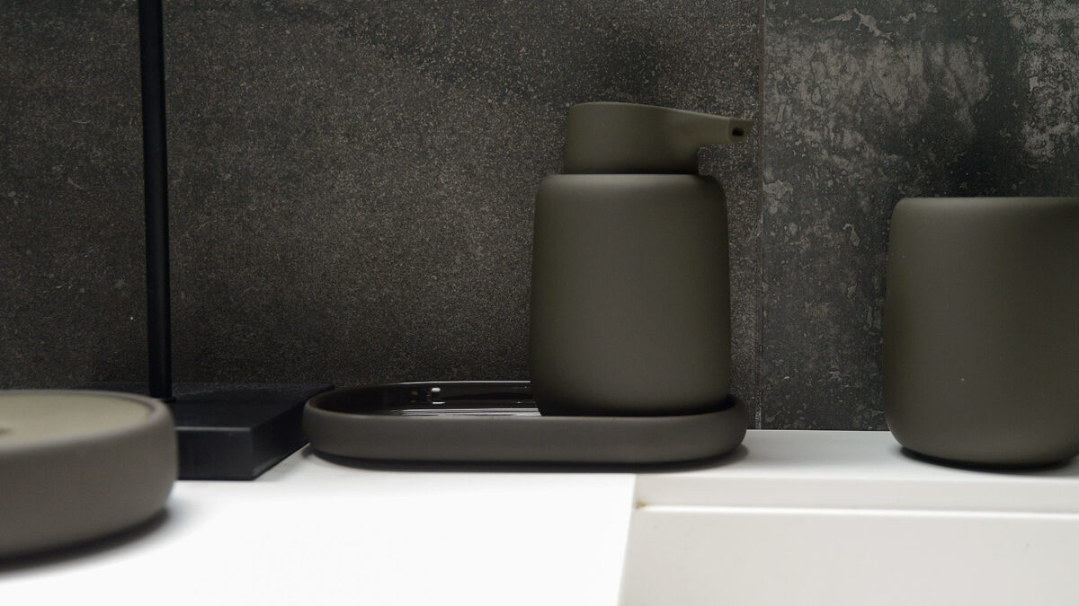 modern bathroom accessories in dark olive