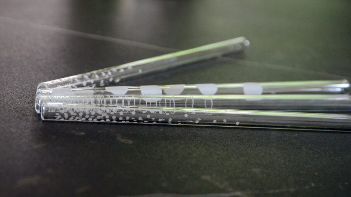 patterned glass drinking straws shown close up