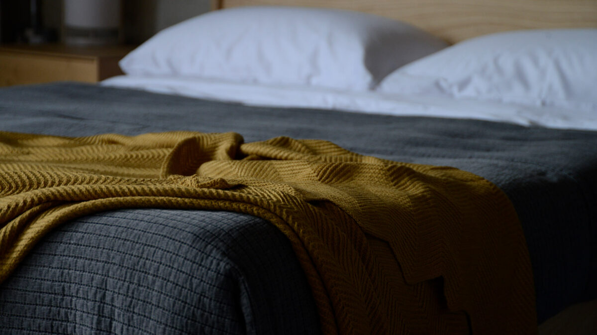 soft knitted textured throw in mustard