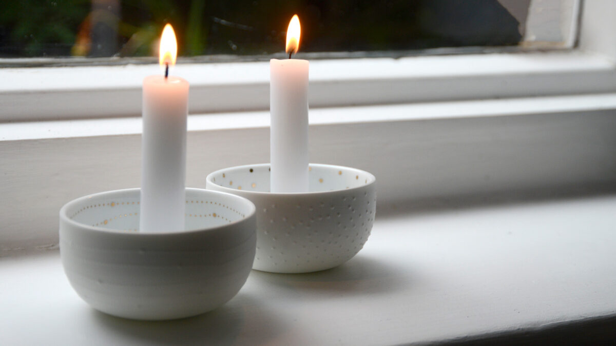 deep porcelain candle holders