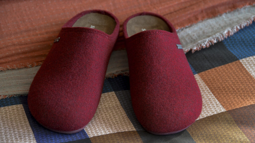 deep red wool slippers.