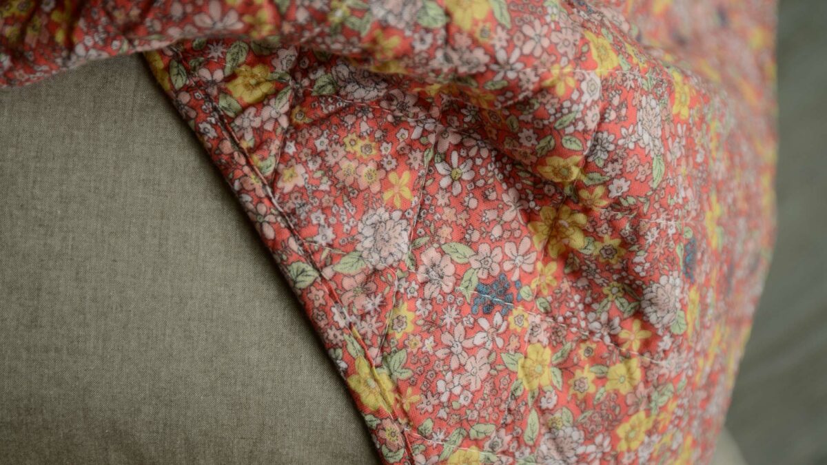 deep rose cotton quilt with floral pattern