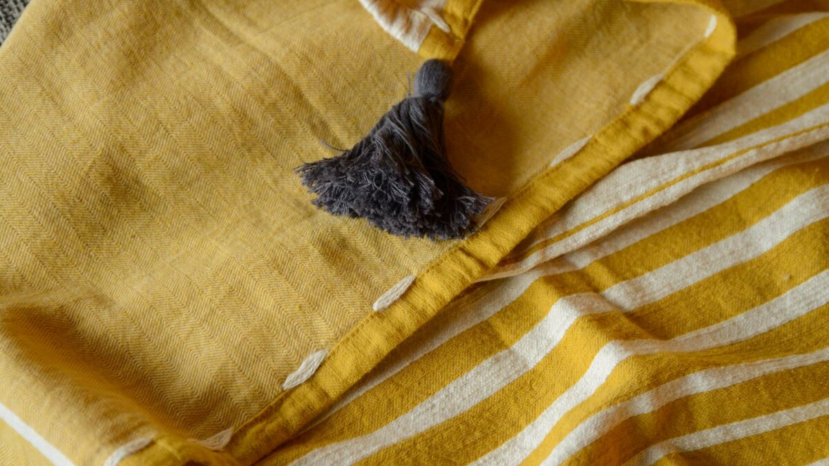 deep yellow printed stripe throw with grey tassel