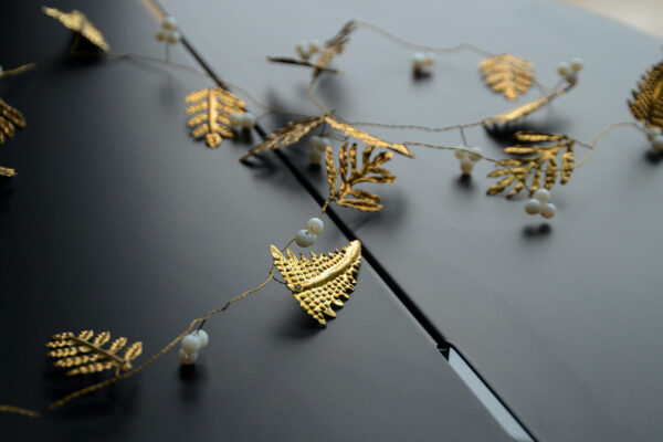 pressed brass leaves xmas garland with white beads