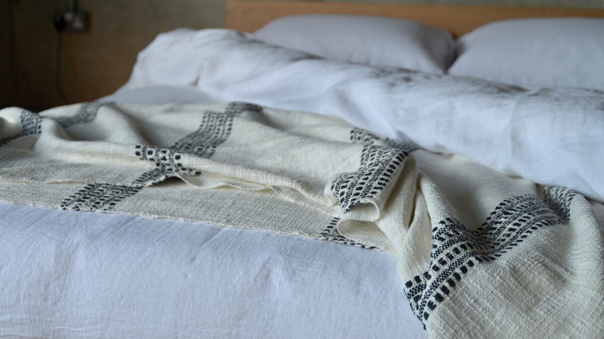 detail textured throw in cream and black