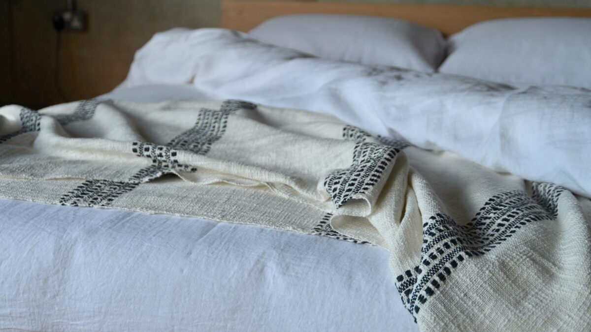 open weave cotton throw in ivory and black