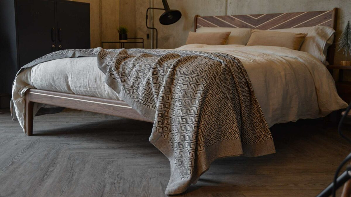 Cotton-rich woven black and white bedspread on our solid wooden special Hoxton bed