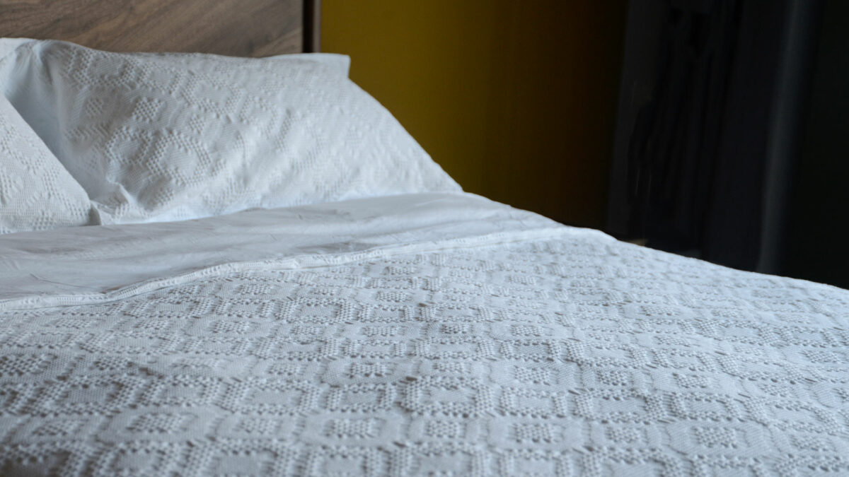 white lace-look waffle design duvet cover set for a hotel bedroom look