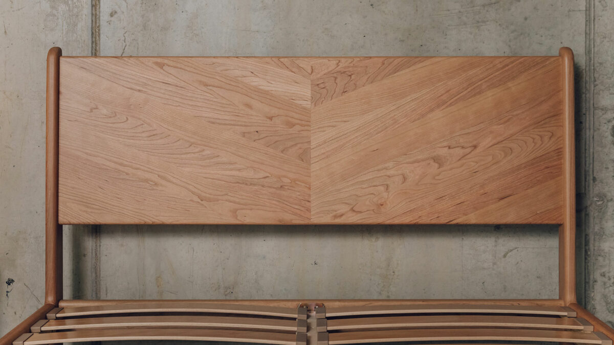 double size cherry wood Hoxton bed a view of the chevron pattern headboard