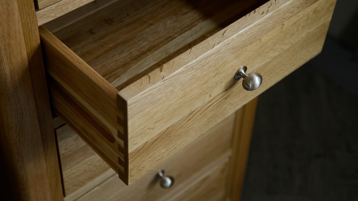 classic oak tallboy chest of drawers shown with drawer open