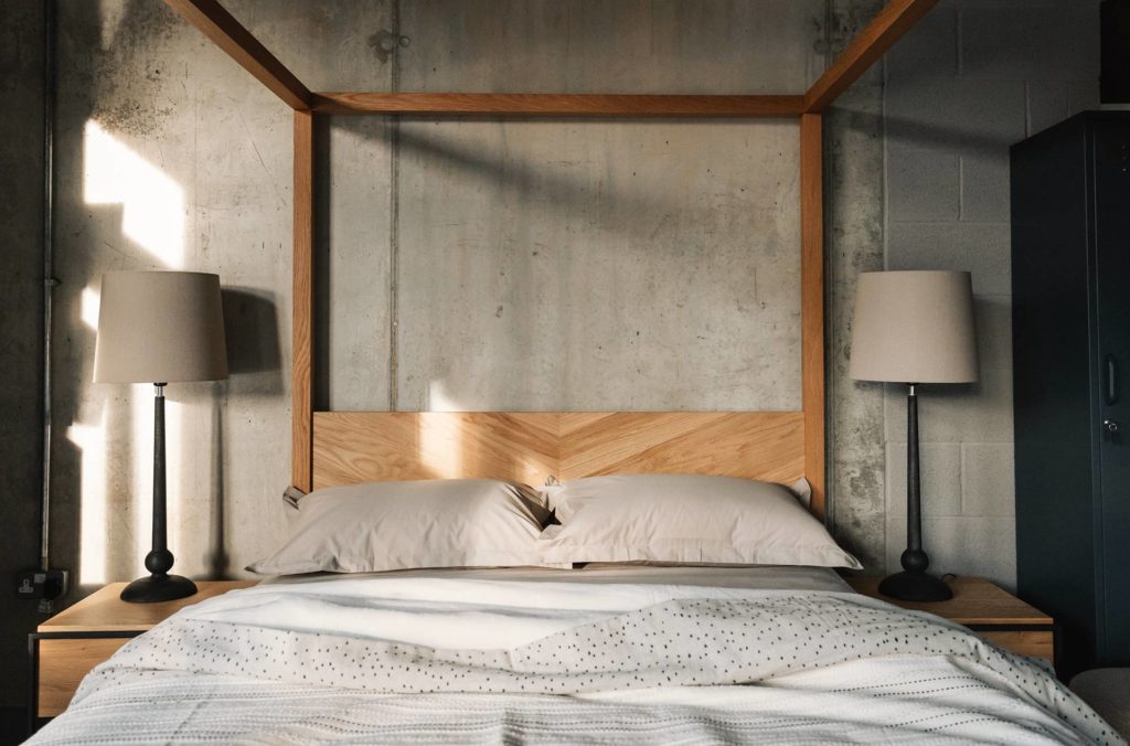 Neutral bedroom scheme - Easycare polycotton bedding on Oak Kelham Four Poster bed