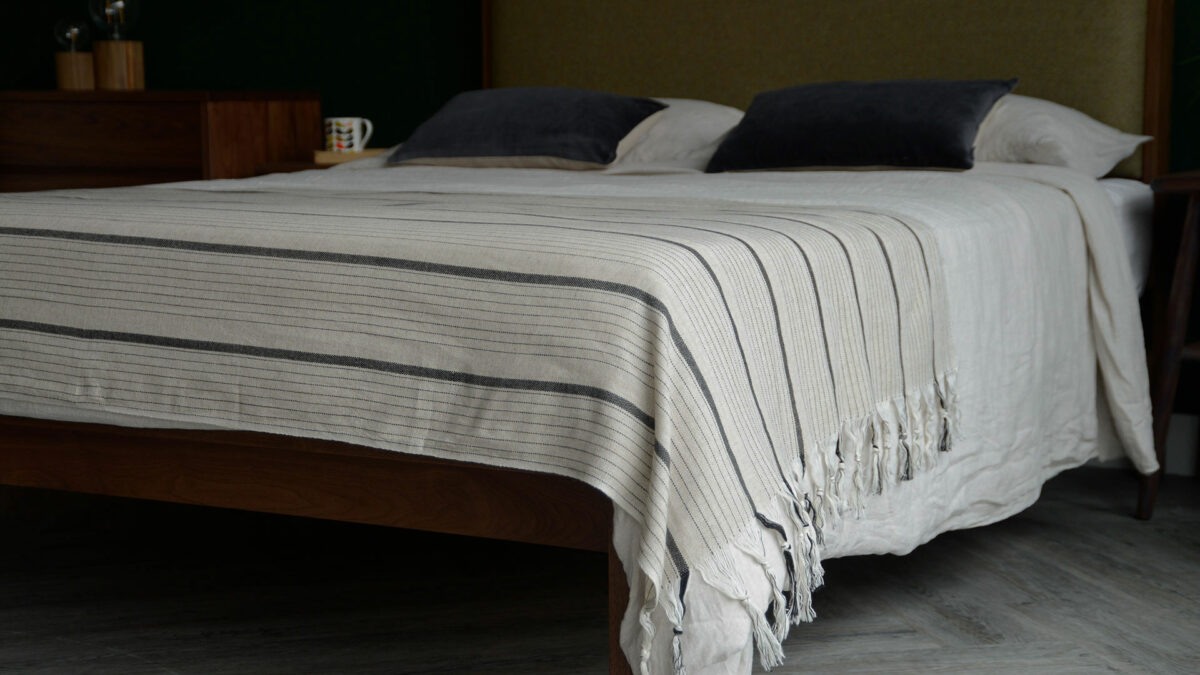 ecru and black striped cotton throw