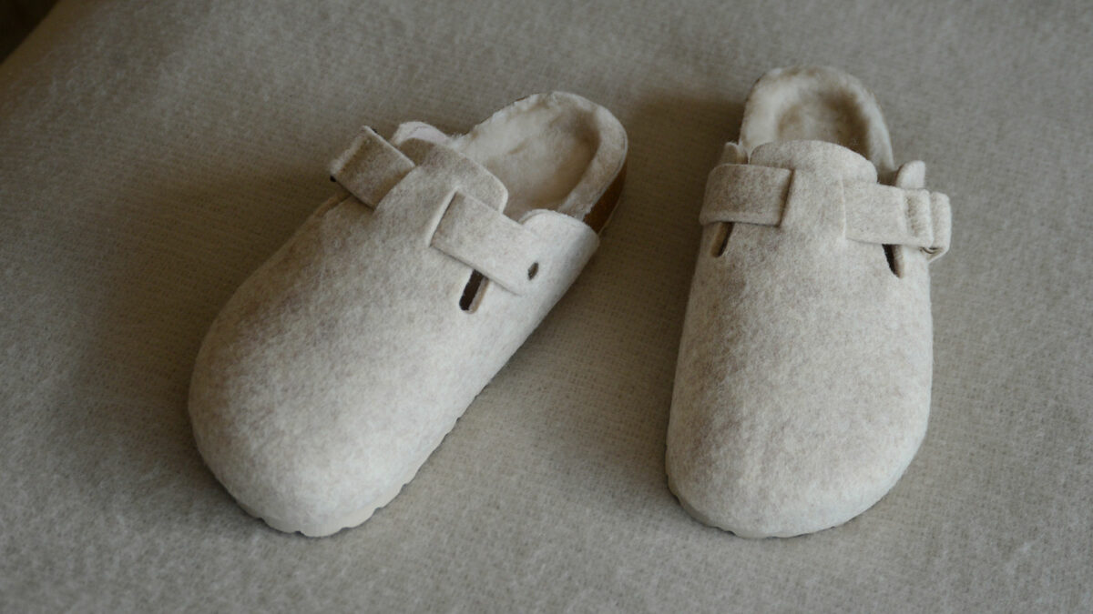 Beige felted wool clog style slippers with sheepskin inners