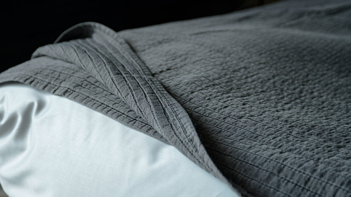 grey textured bedspread