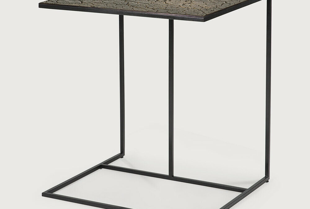 metal framed side table which can overhang a sofa or bed