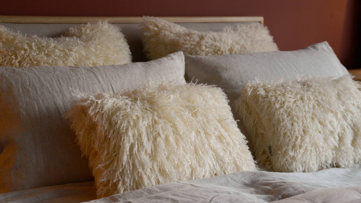 faux afghan cushions cream oblong