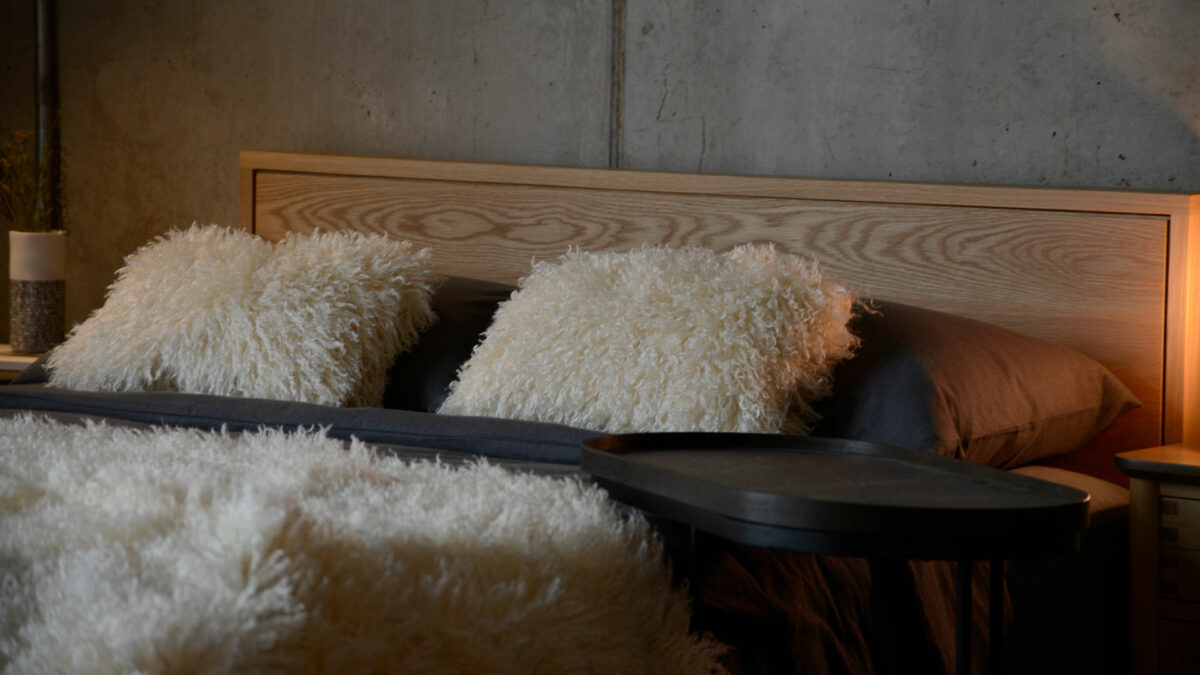 ivory curly sheepskin look bed throw with matching cushions