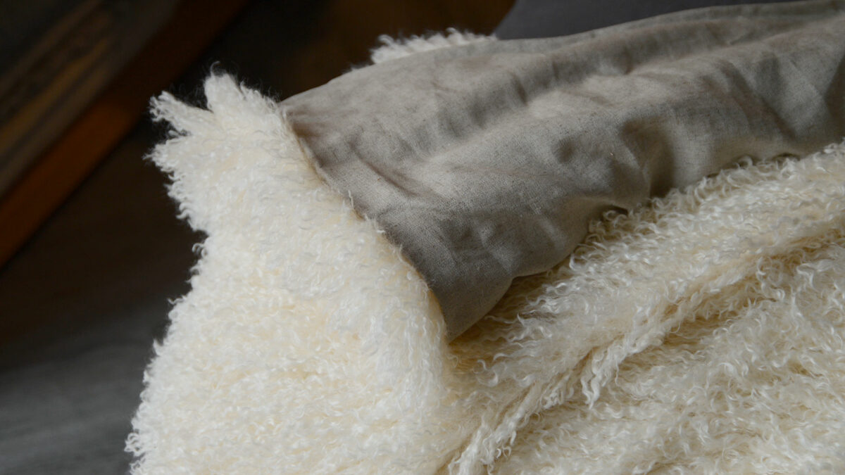 faux afghan throw with fabric reverse