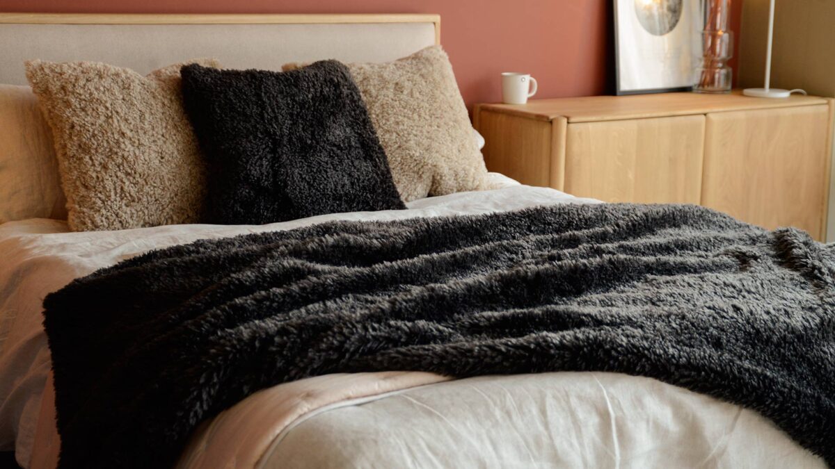 faux fur cushion and throw in dark chocolate faux fur cushions in pebble