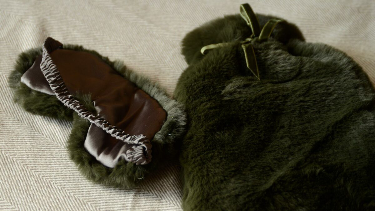 softest luxury faux fur hotwater bottle and eye mask set in olive green