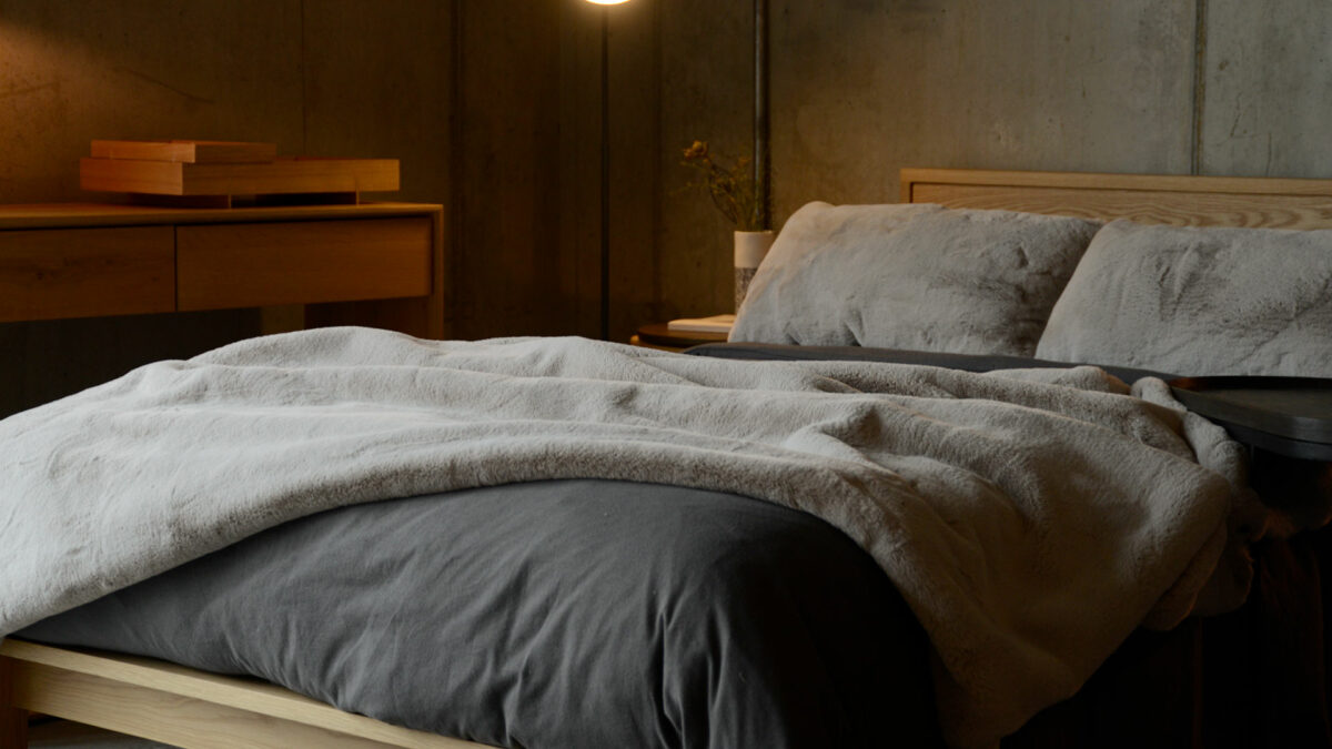 faux fur throw and cushions grey beige colour
