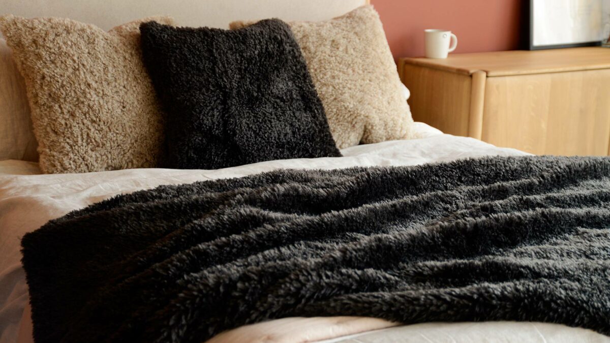 faux fur throw and cushions in espresso brown