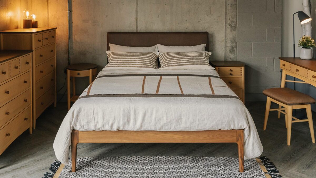 faux leather heabdboard Bloomsbury bed with two tone storage collection