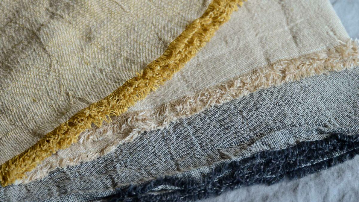 flatlay cotton and linen blend large throws all colours