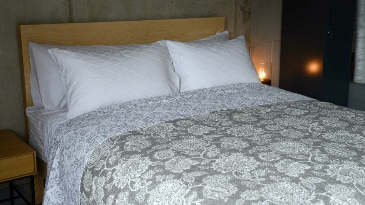 floral print reversible bedspread in grey and ivory