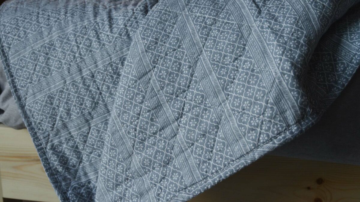 floral-striped-quilted-throw-blue