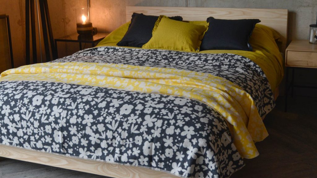 floral-throws-in-charcoal-or-yellow-and-ivory