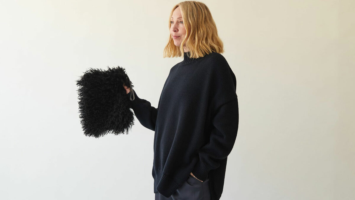 fluffy black faux fur clutch bag with wrist strap