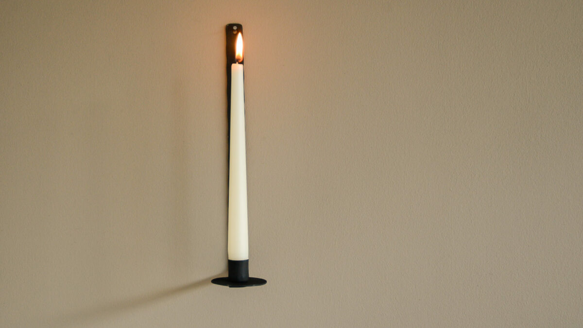 from view wall mounted black metal candlestick holder