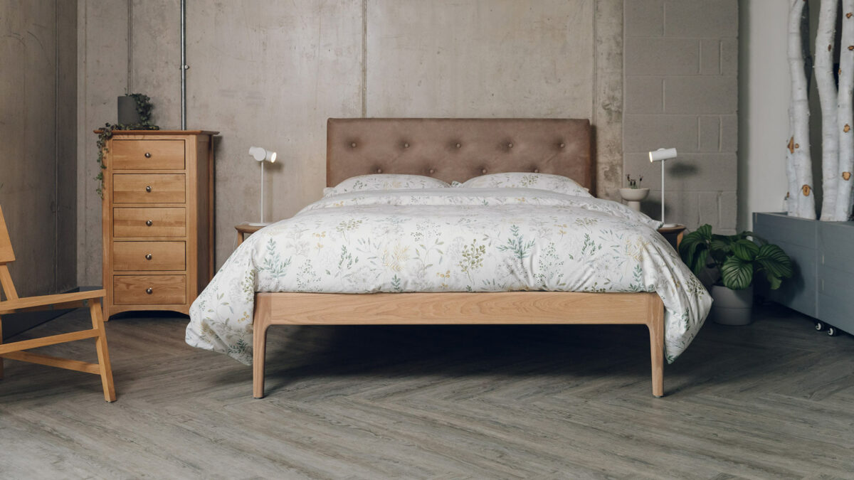 Classic look Oak Bloomsbury bed with oiled frame and a headboard upholstered in a faux leather