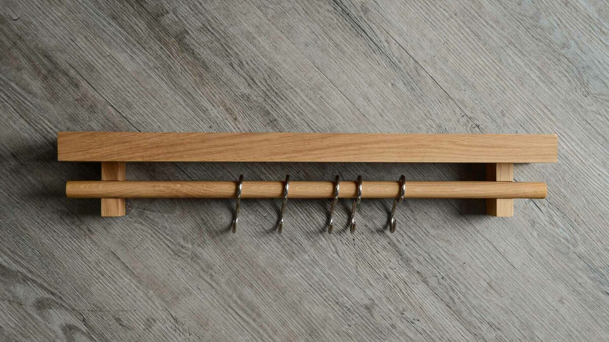 oak kitchen or bathroom storage shelf with stainless steel hooks