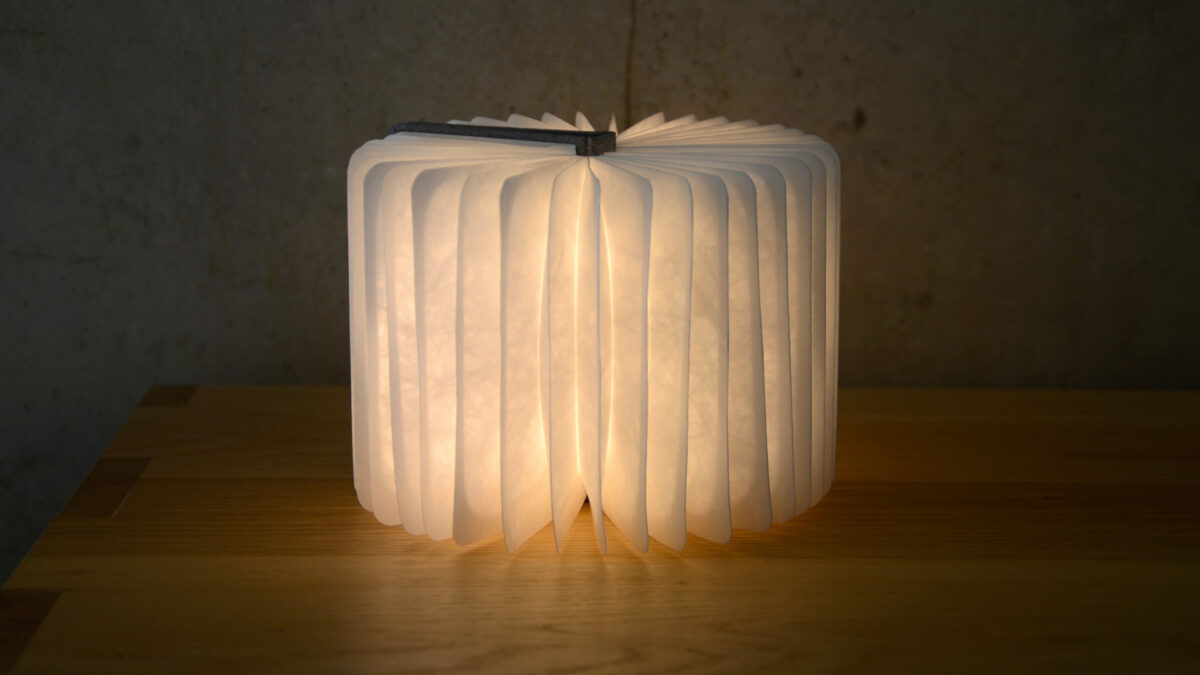 fully opened book light grey cover
