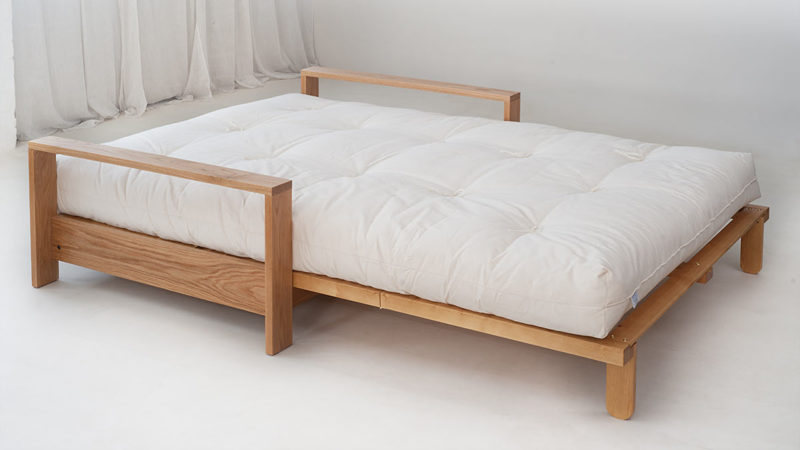 Our Oak Panama sofa-bed showing it folded out for a bed with Futon mattress