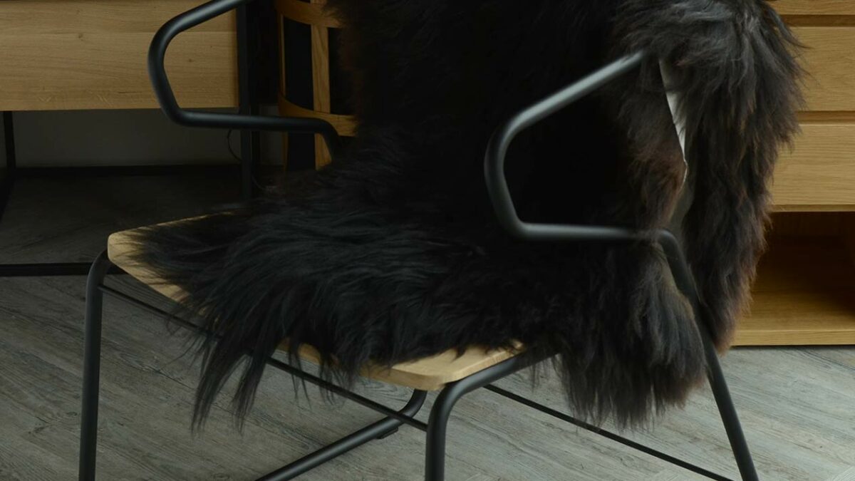 gabbia chair with black sheepskin throw