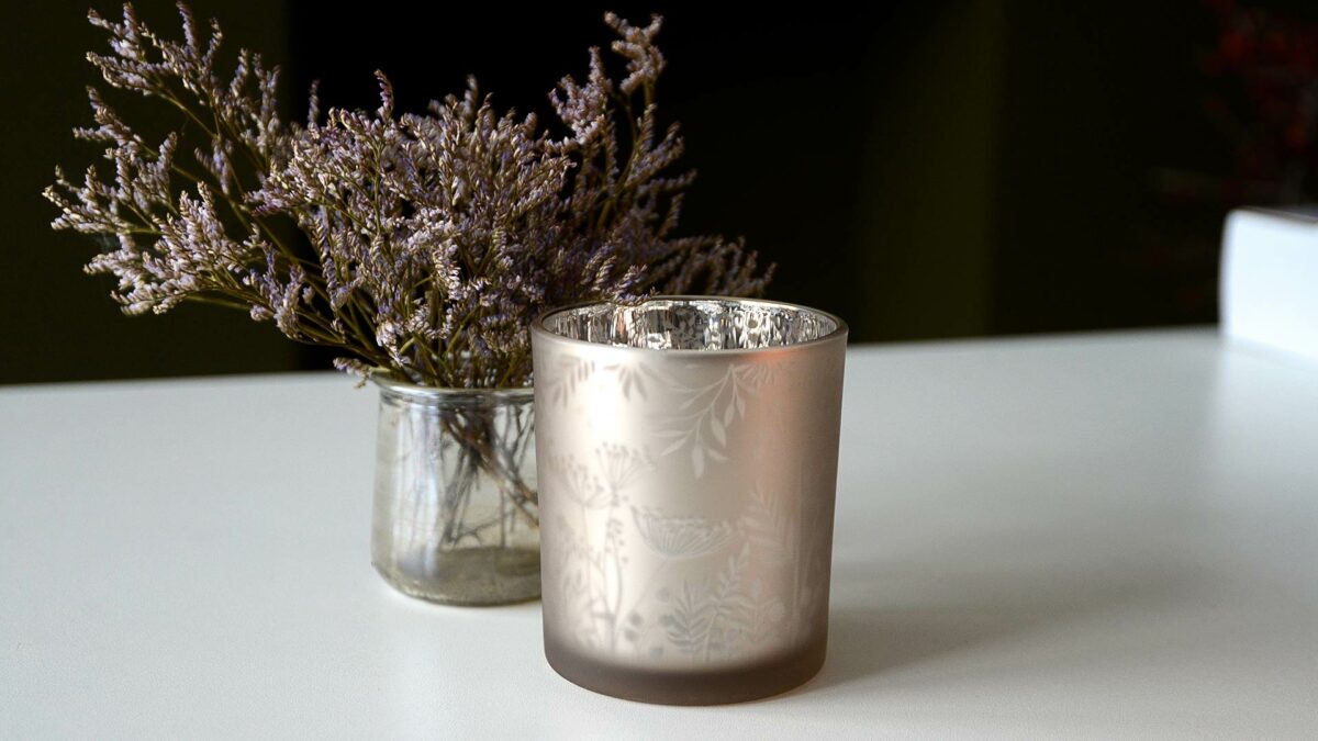 glass candle holder with floral pattern