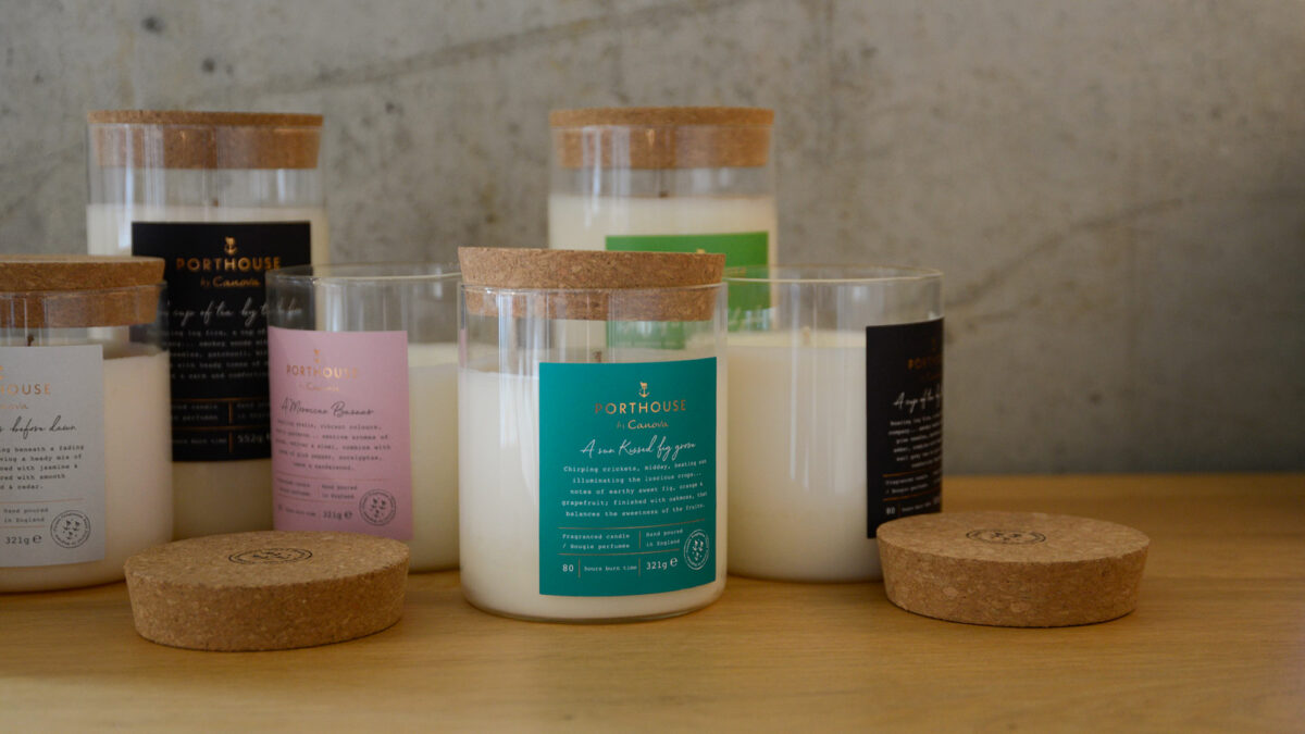 moments inspired scented candles in a glass jar with a cork lid that can be used as a coaster