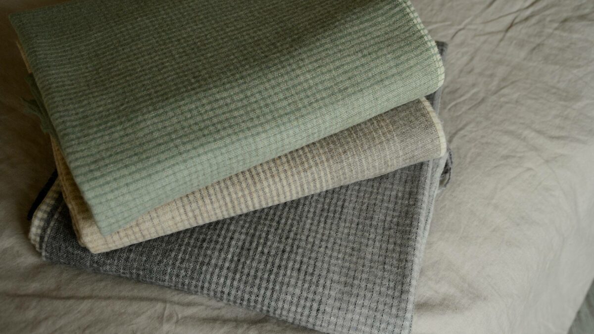 gradient design throws in grey brown and green