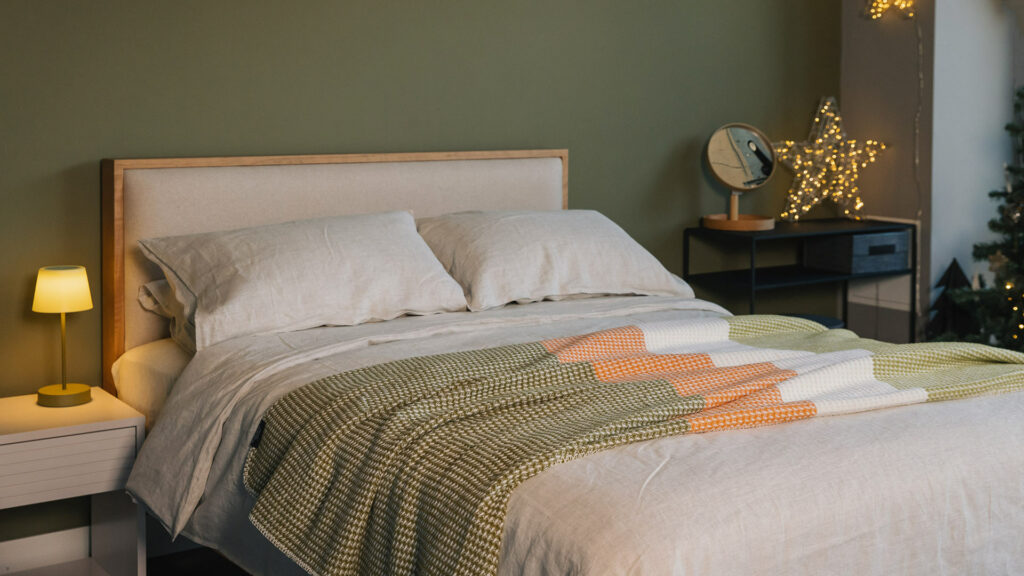 green and orange colour block waffle throw