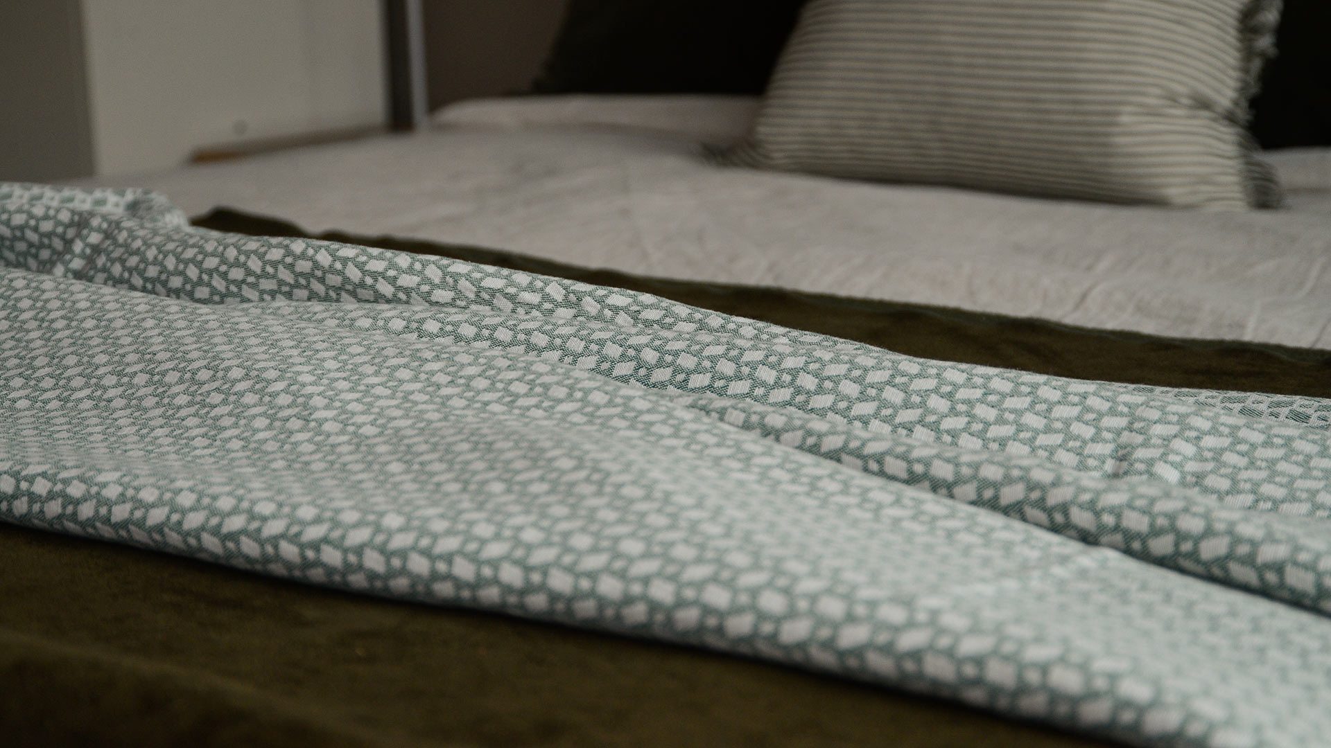 geometric cotton throw green