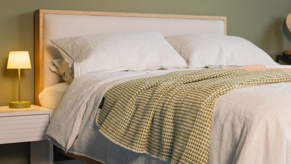 green orange and ivory waffle throw