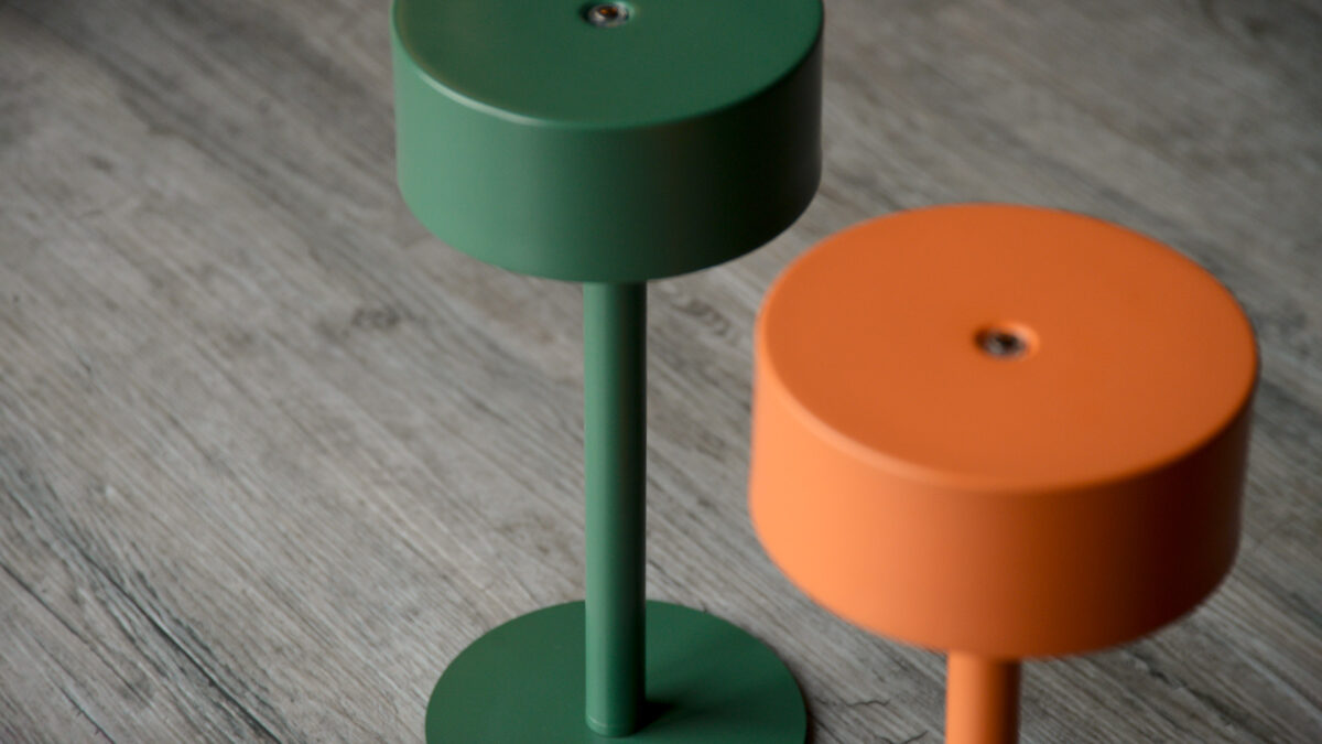 green wireless lamp with orange colour detail